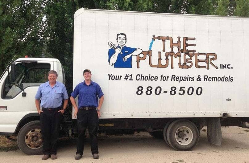 Bryan Sorenson and team beside the The Plumber Inc. company truck